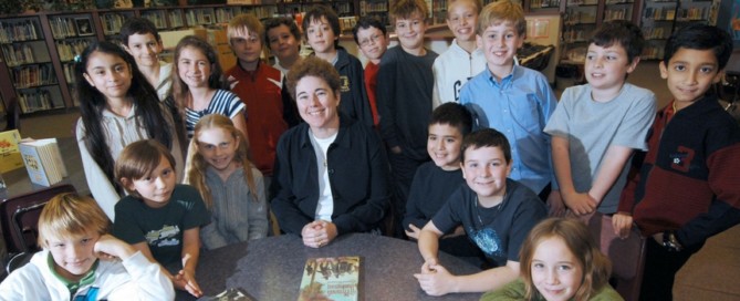 Photo of Kathy Gillespie with students