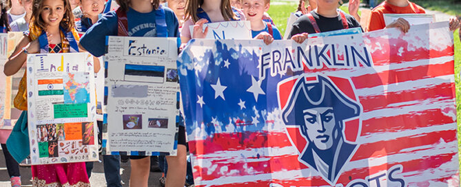 Cultural Parade 2024. Franklin Elementary students marching.